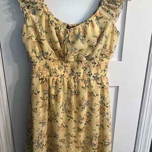 So cute yellow short dress.